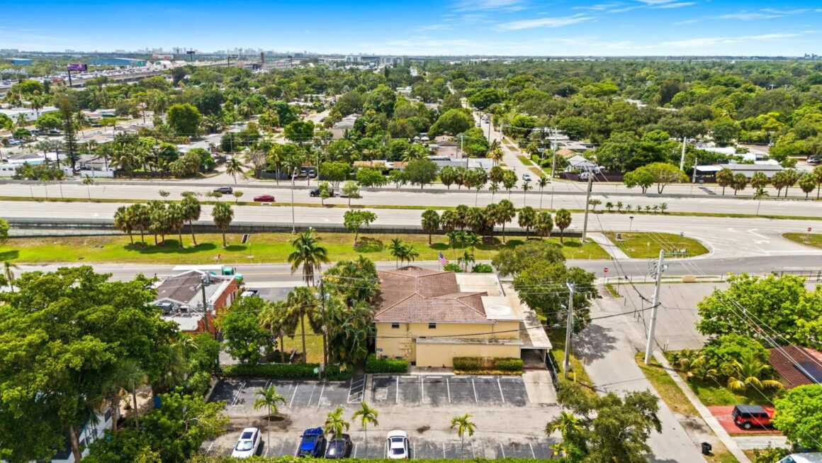 Aerial view of Davie Boulevard office property with downtown Fort Lauderdale skyline