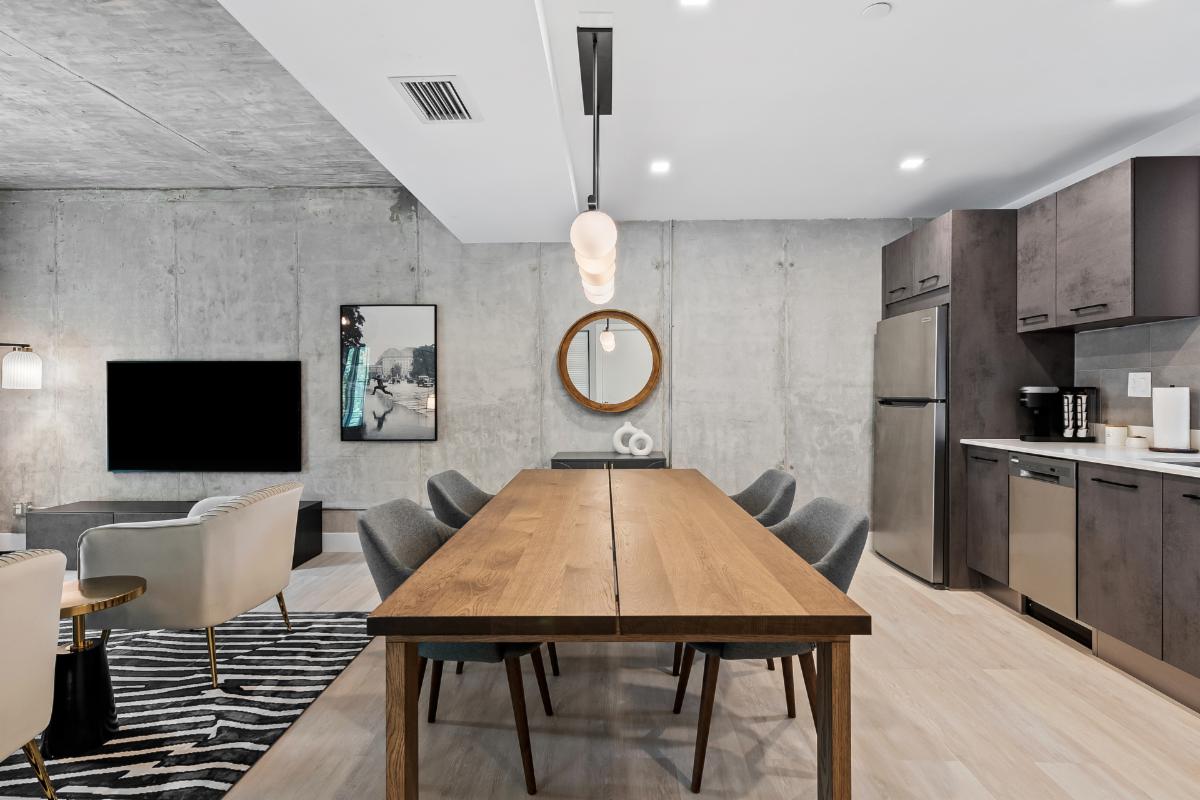 Art Lofts furnished unit dining and living area